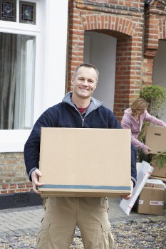 Furniture removal team preparing a move in Acton