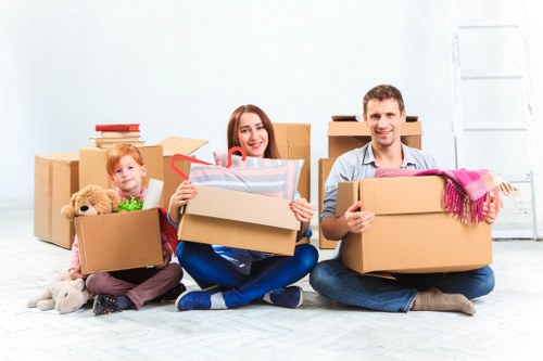 Office removals in Acton planning with moving boxes and desks