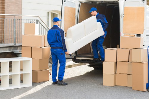 Packed moving boxes and checklist for Acton house removal