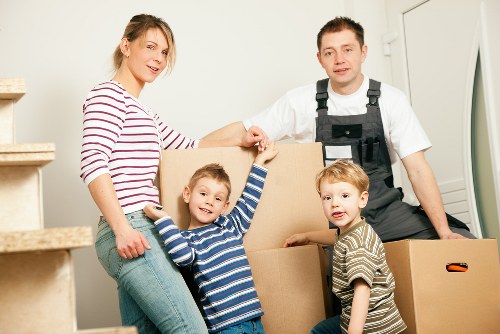 Removal team planning a safe move with packing equipment